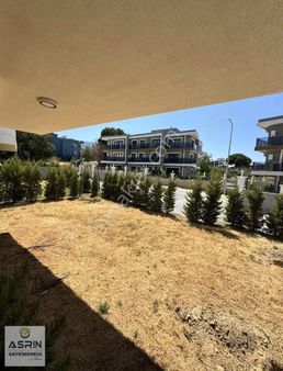 Kuşadası Davutlarda Bahçe Katı Sıfır Havuzlu 2+1 Satılık Daire
