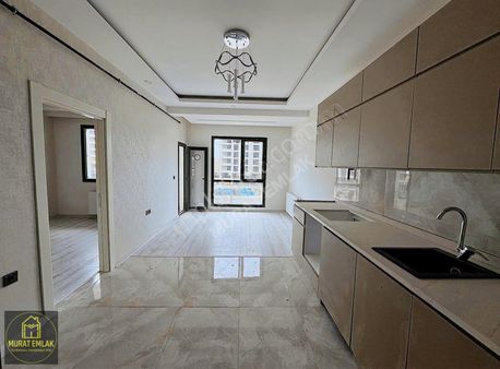 Murat Emlaktan Ana Cadde Üzerinde 1+1 Lüks Dairelerimiz Satılık