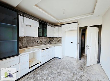 Evbul'dan İnci Koleji Yanında Satılık 2+1 Ara Kat Daire