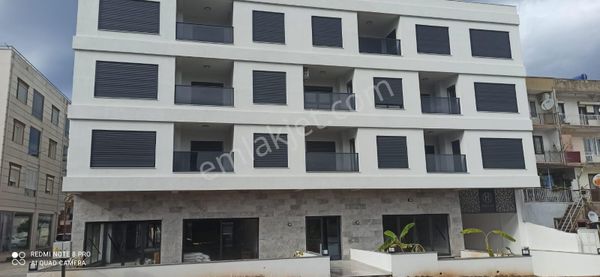 Davutlar'da Merkez'de 2+1 Yerden Isıtmalı Sıfır Satılık Daire