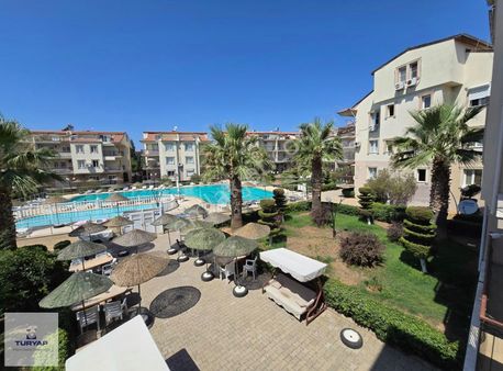 Didim Merkez Konumda Havuzlu Site İçinde 1+1 Satılık Daire