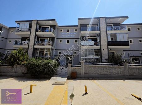 Yenifoça'da Satılık Zemin Kat Bahçeli Geniş 2+1 Daire