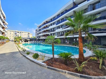 Kuşadası Merkezde Yeni Sitede 2+1 Bahçe Katı Daire