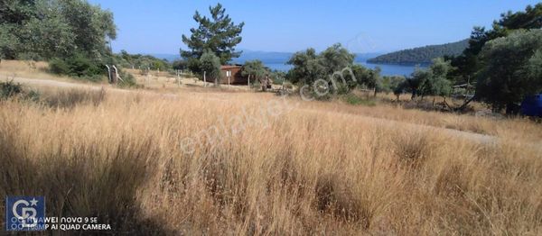 Akbük Koyu Ful Deniz Manzaralı Yol Cepheli Yatırımlık Arsa