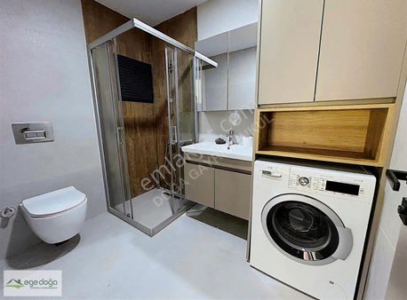 Kuşadası Davutlarda Sıfır Bakçe Katı Satılık Daire