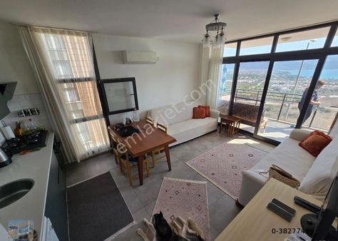 Akbük'te Havuzlu Sitede 2+1 Deniz Manzaralı Satılık Daire