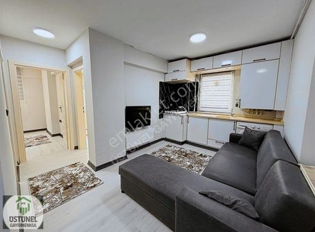 Üstünel'den Merkezi Konumda Yenilenmiş Eşyalı 2+1 Satılık Daire