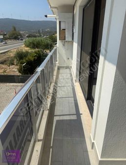 Yenifoça Cumhuriyet Mahallesinde Doğalgazlı Kiralık 1+1 Daire