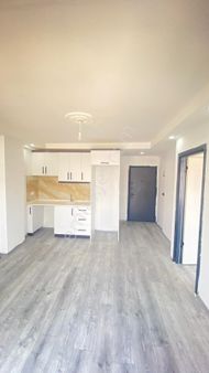 Davutlar'da Önü Açık Pazar Yerine Yakın 1+1 Sıfır Satılık Daire