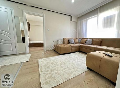 Özhan Emlaktan Yeni Boyalı,arakat,çift Balkonlu 2+1