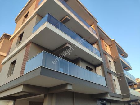 Kemalpaşanın Merkezinde Acil Satılık Yeni Sıfır 2+1 Asansörlü Doğalgazlı Daire