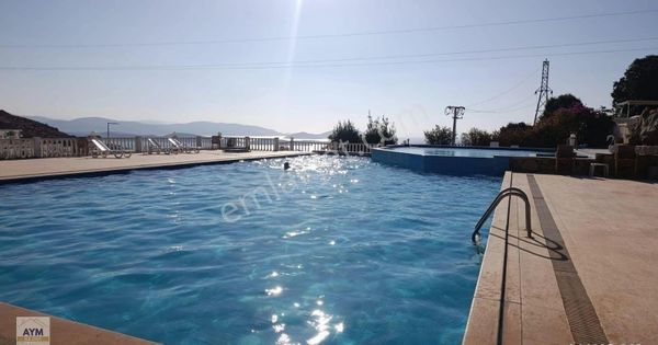Bodrum Bağla,da Havuzlu Plajlı Sitede Satılık 3+1 Mustakil Ev
