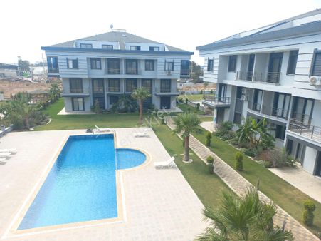 Didim'de Merkezde Havuzlu Sitede Satılık 3+1 Geniş Teraslı Dubleks Daire