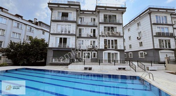 Üstünyer Emlak'tan Ekinoba Manolya Evlerinde Satılık 3+1 Daire