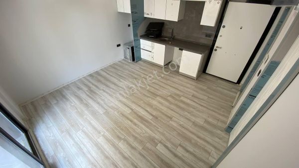 Poyraz Gayrimenkul'den Akçay Kordon'da Satılık Sıfır 1+1 Daire