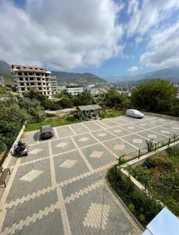 Çıplaklı Merkezde Ferah 1+1 Otoparklı,asansörlü Satılık Daire