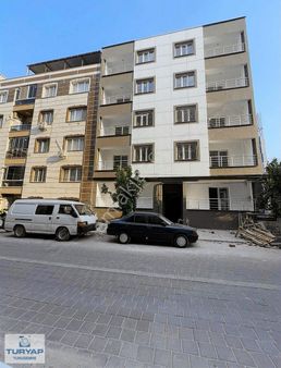 Saruhanlı Çarşı Merkezde Satılık Daire