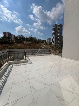 Kulepark~ayrıcalığı~ile~50~m2~teraslı~sıfır~eşyalı~1+1~900~bin~tl~kredili