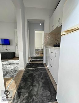 Özhan Emlaktan Merkezi Konumda Site İçerisinde Ara Kat 2+1 Daire