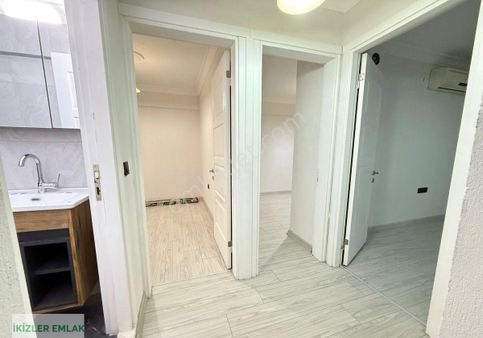 Seferihisar Ürkmez Merkezde Satılık 2 + 1 Masrafsız Denize 200 Metre Uzaklıkta Daire