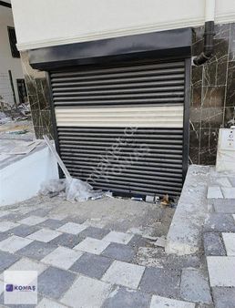 Kon/aş Emlak'dan Kiralik Taşoluk'da Yüksek Giriş 0 Bina