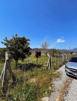 Milas Karşıyakada Yola Cepheli Altyapılı Satılık Tarla