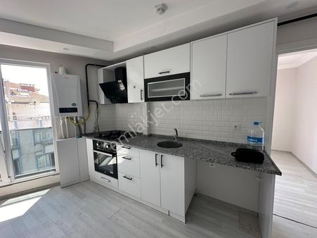 Atuğ Emlak'tan Merkezi Konumda 1+1 Satılık Daire