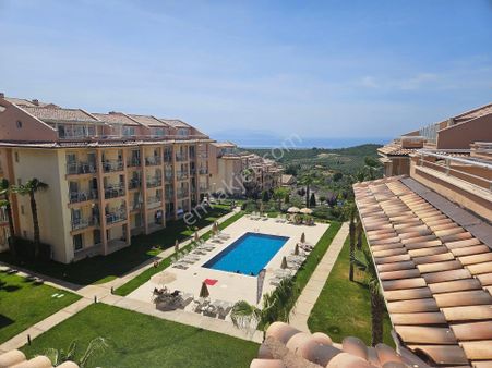 Kuşadası Golf Resort'te Satılık 3 Balkonlu 2+1 Çatı Dubleks