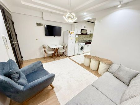 Kz Grup'tan Asmalıevler'de 2+1 65m2 Sıfır Eşyalı Bahçe Kat Satılık Eşyalı Apart