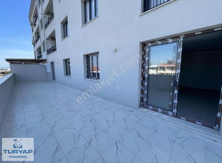 Saruhanlı Merkezde Teraslı Otoparklı Daire