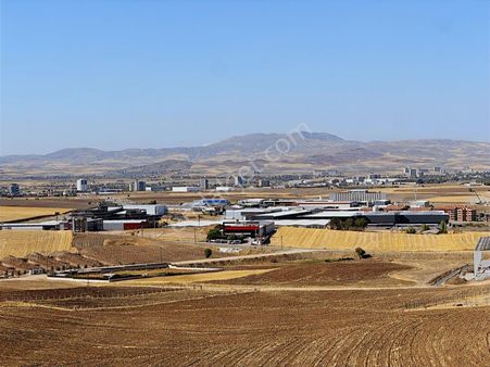 /lider Gayrimenkul'den /güzelhisar Mah 1.000m2 Hisse Tapu Tarla.