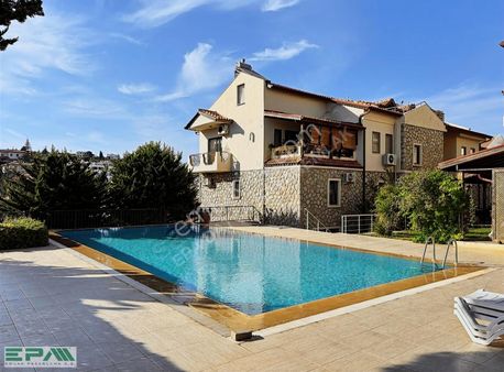 Datça Şehir Merkezinde Havuzlu Sitede Kiralık Bahçe Katı Daire