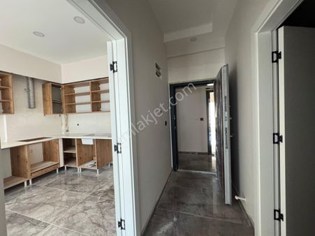 Kuşadası Güzelçamlı Satılık Sıfır Yapım Bahçeli 1+1 Daire