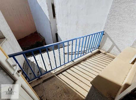 Özbey Emlak Gaffar Okkan Caddesi Yakını Ara Kat 2+1