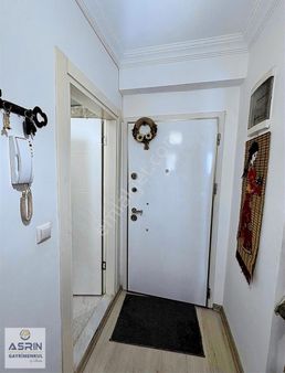 Kuşadasında Masrafsız Manzaralı Havuzlu Geniş 1+1 Satılık Daire