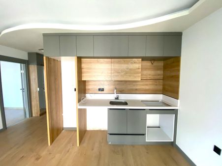 🌀gültaş Emlaktan Akçayda Satılık Göz Kamaştıran 1+1 Daire Asansörlü