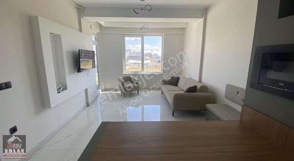 Afyon Özsu Emlak'tan Diş Hastanesi Arkasında Eşyalı 1+1 Daire