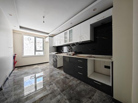 Bostancık'ta Sıfır Bina 3+1 Satılık Giriş Kat