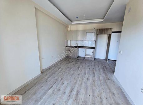 Tömük De İskanlı Havuzlu Denize Yakın Cepheleri Açık 1+1 Satılık