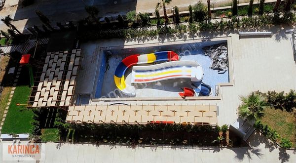 Aquaparklı Kapalı Yüzme Havuzlu Sosyal Donatılı 1+1 Açık Mutfak