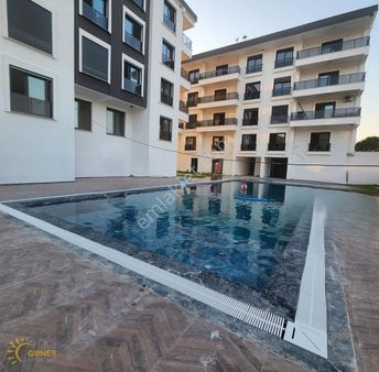 Didim'de Asansörlü Havuzlu Sitede Sıfır 2+1 Satılık Daire