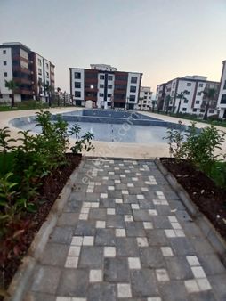 İzmir Torbalı Muratbey Mahallesinde 3+1 Sıfır Havuzlu Sitede Satılık Daire