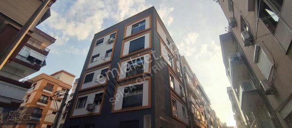 Karşıyaka Nergizde Merkezi Konumda Sıfır 1+1 Satılık Daire