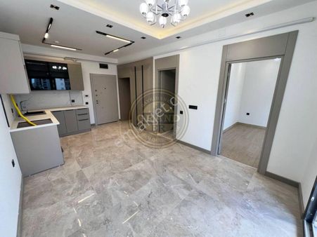 Mezitli Akdeniz Mah.yaşardoğu Caddesi Sıfır 1+1 Satılık Daire
