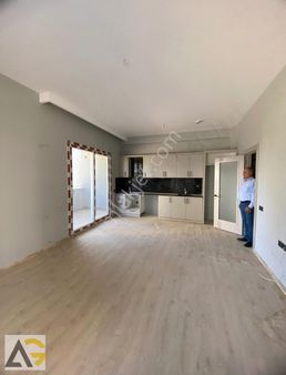 Auradan Tömükte Satılık 2+1 Daire (havuz)