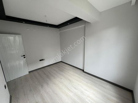 Akademi Emlak'tan Zafer'de Asansörlü Sıfır 1+1 Satılık Daire