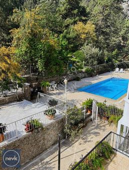 Fethiye Karagözler'de Deniz Manzaralı 3+1 Havuzlu Sitede