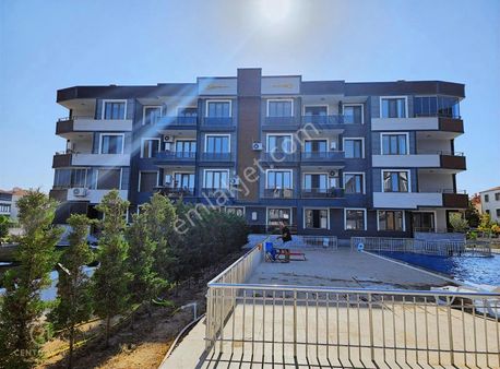 C21 Bal'dan Ayvalık Altınovada Havuz Cepheli Satılık 2+1 Daire