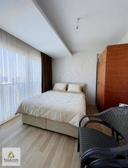 7\24~güvenlikli~1+1~sıfır~eşyalı~cadde~üzeri~site~içerisi~cazip