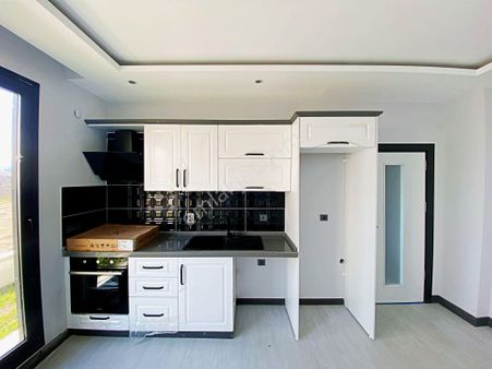 🌀gültaş Emlaktan Akçay Altınkumda Satılık 1+1 Bahçe Kullanımlı Daire